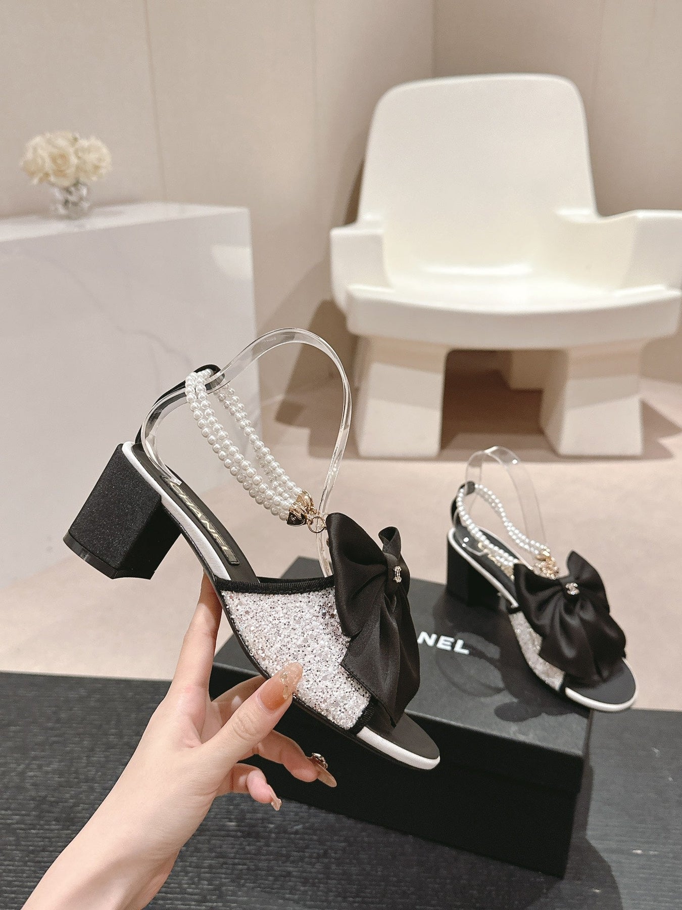 HIGH SANDAL WITH PEARL CHAIN BLACK LAMBSKIN WITH WHITE RHINESTONES