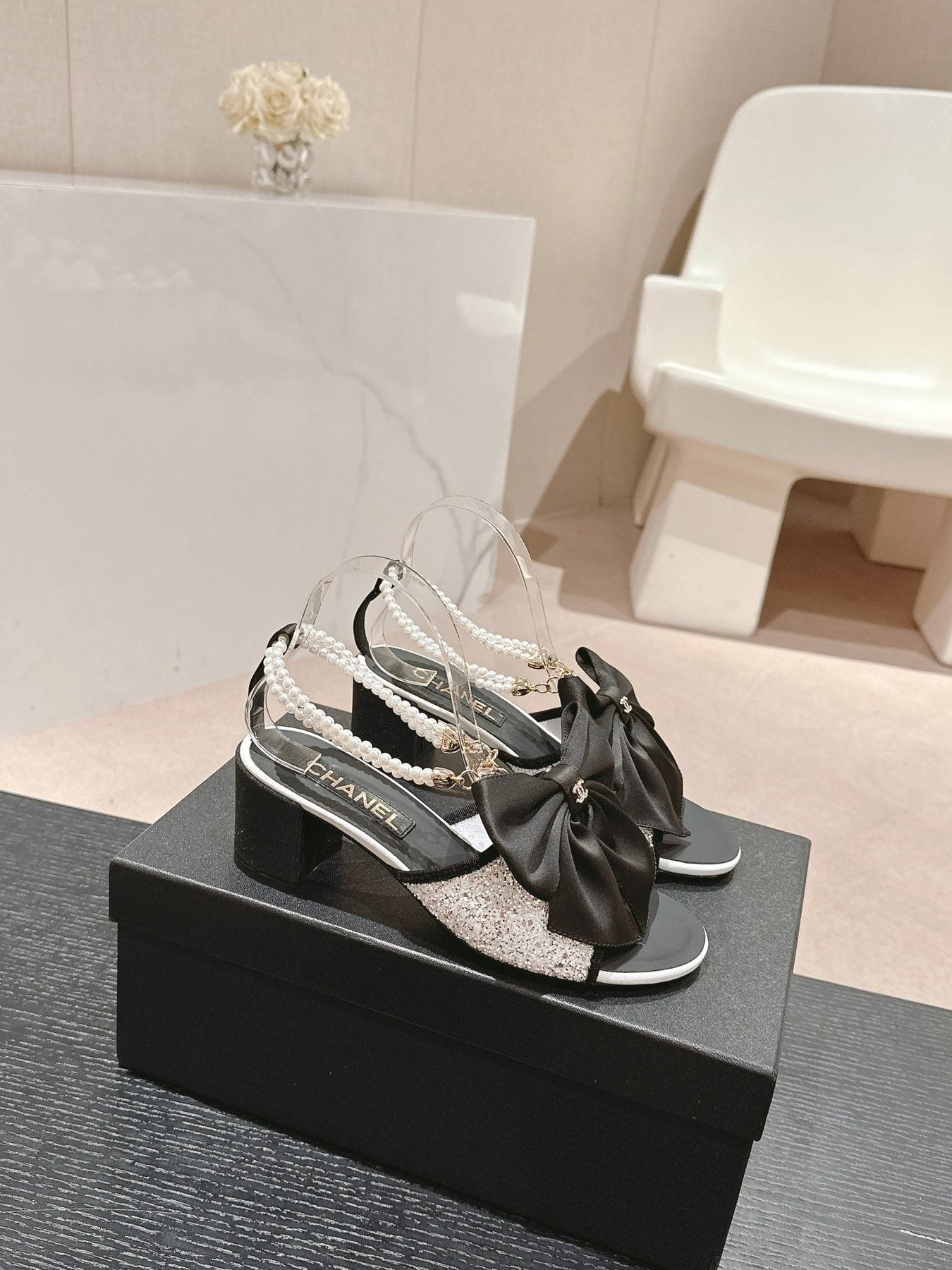 HIGH SANDAL WITH PEARL CHAIN BLACK LAMBSKIN WITH WHITE RHINESTONES