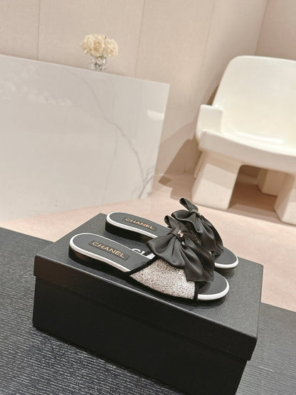 BOW LADY SLIPPERS BLACK LAMBSKIN WITH WHITE RHINESTONES