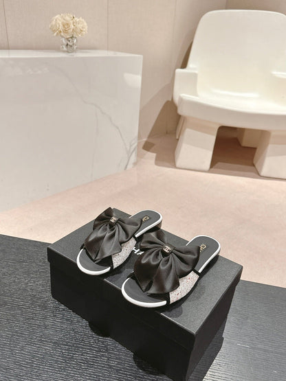 BOW LADY SLIPPERS BLACK LAMBSKIN WITH WHITE RHINESTONES