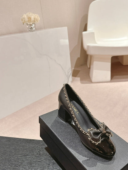 BOWKNOT HIGH HEELS IN BLACK SHEEPSKIN