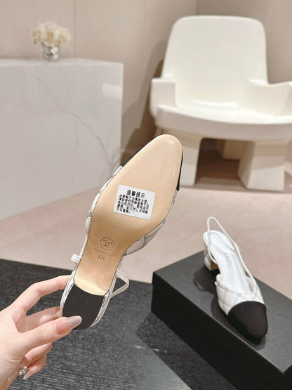 HIGH SLINGBACKS IN WHITE LAMBSKIN AND BLACK SATIN