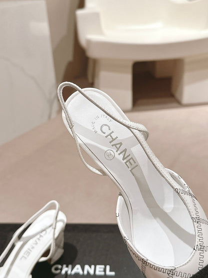 HIGH SLINGBACKS IN WHITE LAMBSKIN AND BLACK SATIN