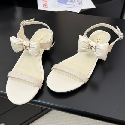 FLAT SANDALS IN WHITE CALFSKIN WITH BOW