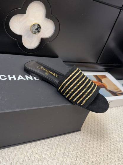 FLAT SLIDE IN BLACK SUEDE WITH GOLD CRYSTALS