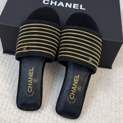 FLAT SLIDE IN BLACK SUEDE WITH GOLD CRYSTALS