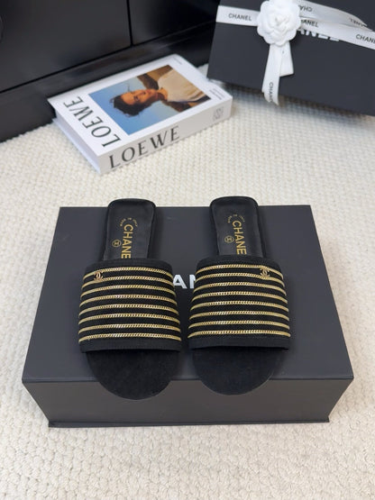 FLAT SLIDE IN BLACK SUEDE WITH GOLD CRYSTALS