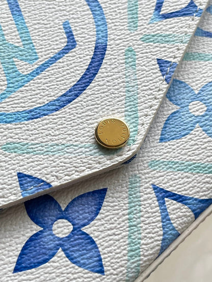 FÉLICIE POCHETTE 21 IN LAGOON BLUE MONOGRAM TILES CANVAS