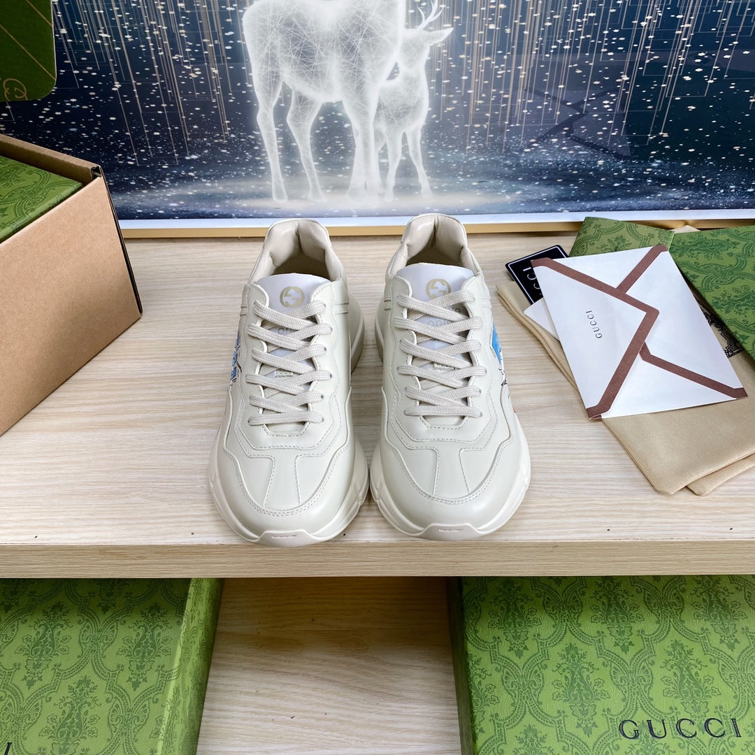 GG COUPLE TRAINER WHITE CALFSKIN WITH DONALD DUCK ICON