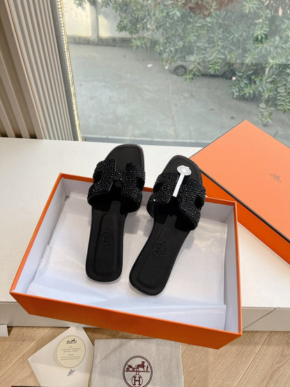 0RAN SLIDE IN BLACK CALFSKIN WITH CRYSTALS