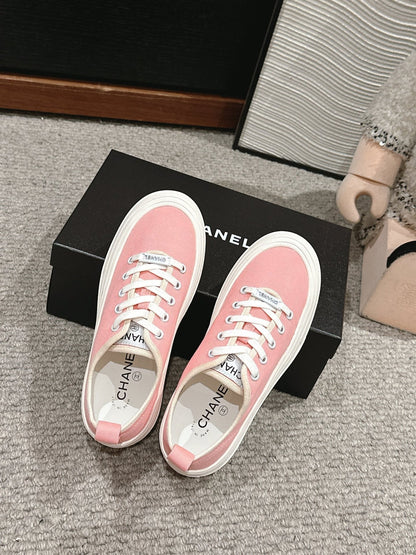 LACE-UP SNEAKERS IN PASTEL PINK CANVAS