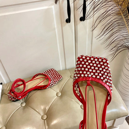LACE-UP FLAT SANDAL IN RUBY RED METALLIZED MESH AND LEATHER WITH RHINSTONES