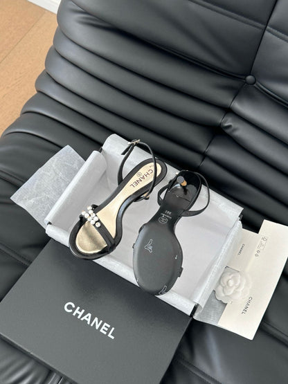 PEARL SANDAL IN BLACK AND GOLD LAMBSKIN 75 MM