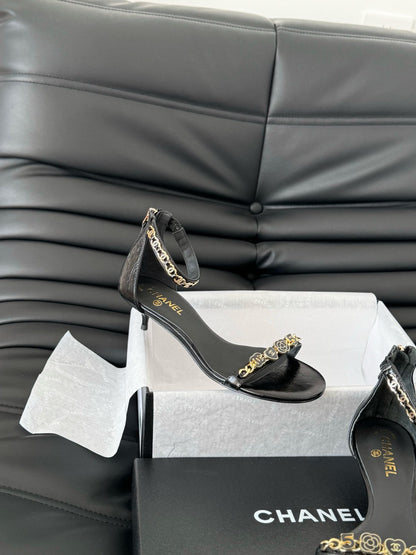 MID-HEEL 35 MM SANDAL IN BLACK SHEEPSKIN WITH STICKERS