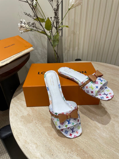 FLAT MULES IN WHITE MONOGRAM LAMBSKIN