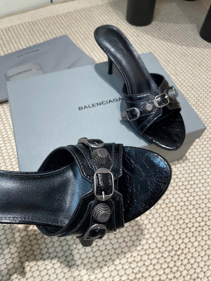 CAGOLE HIGH MULES IN BLACK OIL-WAX SHEEPSKIN