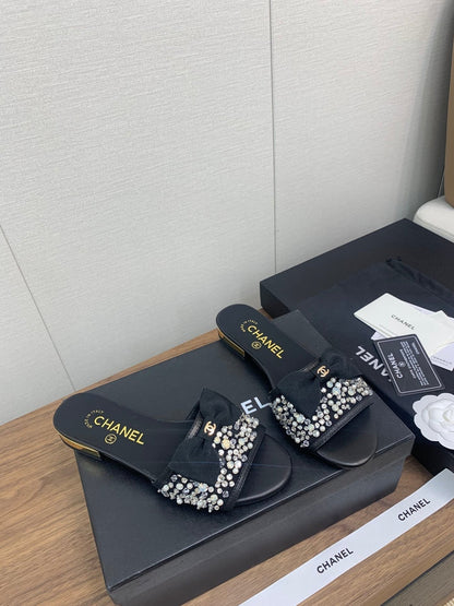 BOW SLIPPERS IN BLACK LAMBSKIN WITH RHINESTONES