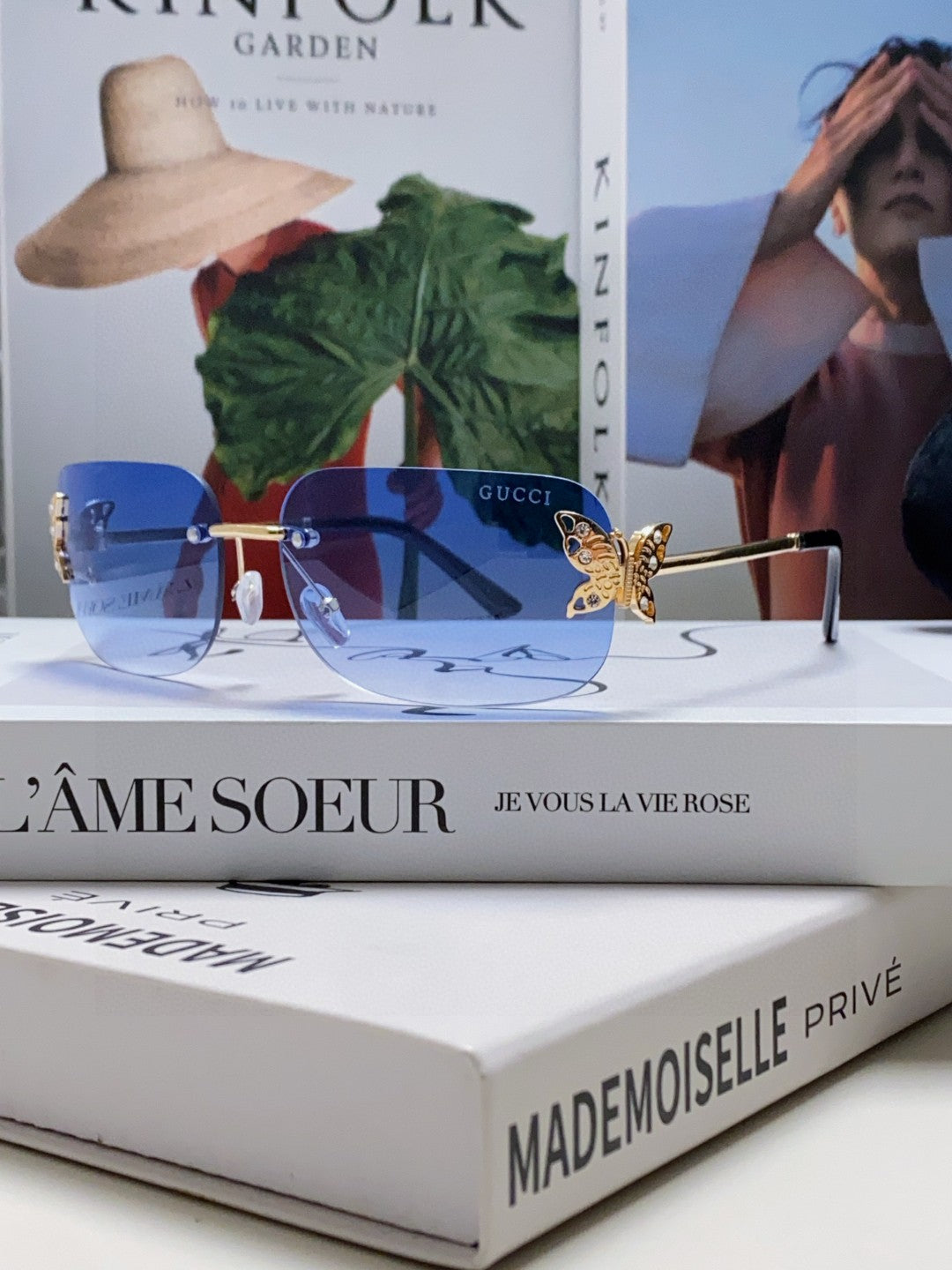 BUTTERFLY EMBELLISHED RIMLESS RECTANGULAR FRAME SUNGLASSES 570245 IN METAL