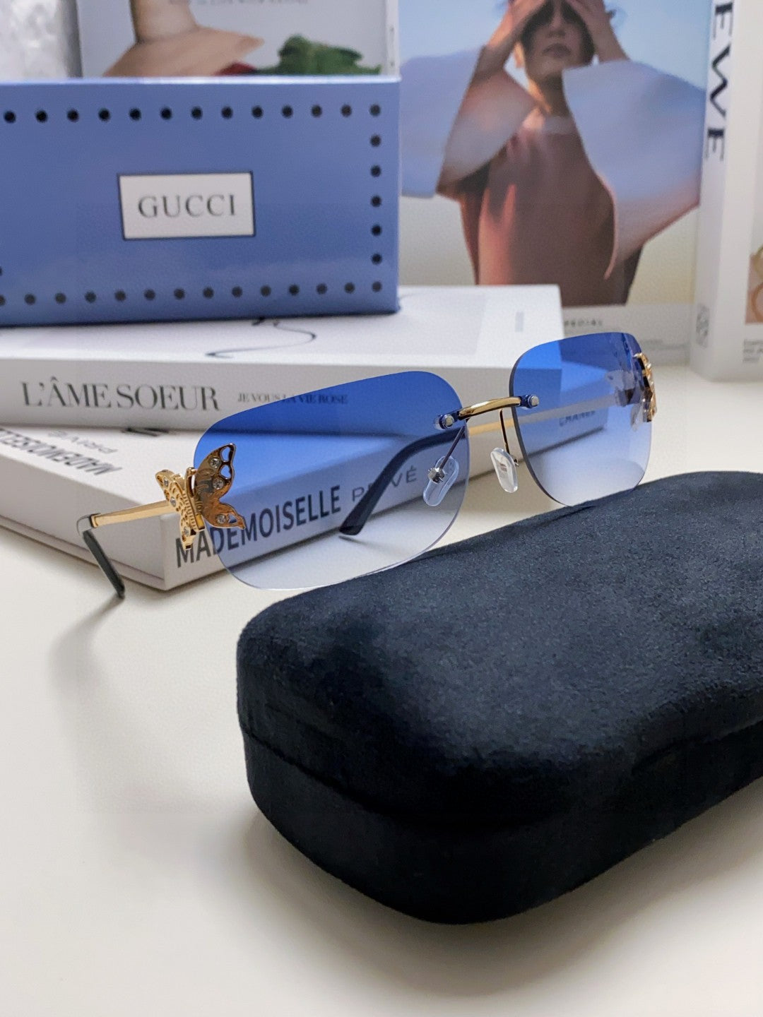 BUTTERFLY EMBELLISHED RIMLESS RECTANGULAR FRAME SUNGLASSES 570245 IN METAL