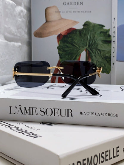 BUTTERFLY EMBELLISHED RIMLESS RECTANGULAR FRAME SUNGLASSES 570245 IN METAL