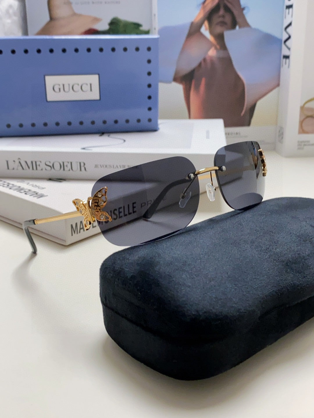 BUTTERFLY EMBELLISHED RIMLESS RECTANGULAR FRAME SUNGLASSES 570245 IN METAL