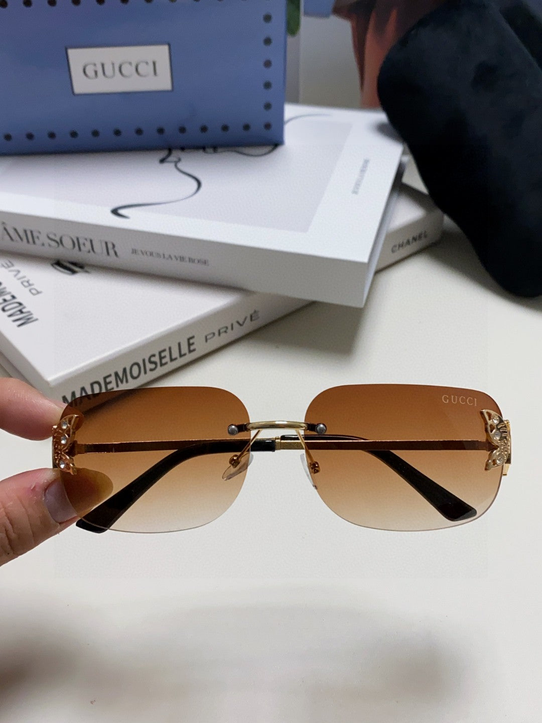 BUTTERFLY EMBELLISHED RIMLESS RECTANGULAR FRAME SUNGLASSES 570245 IN METAL