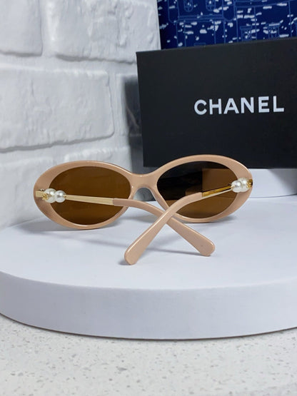 OVAL SUNGLASSES 640341 IN NUDE ACETATE METAL FRAME