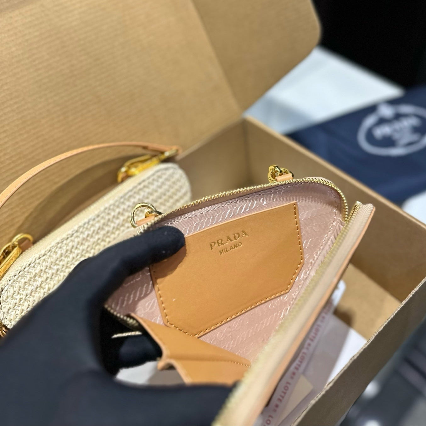 EMBROIDED LOGO TRIANGLE BAG 18 IN BEIGE WOVEN RAFFIA GOLD CHAIN