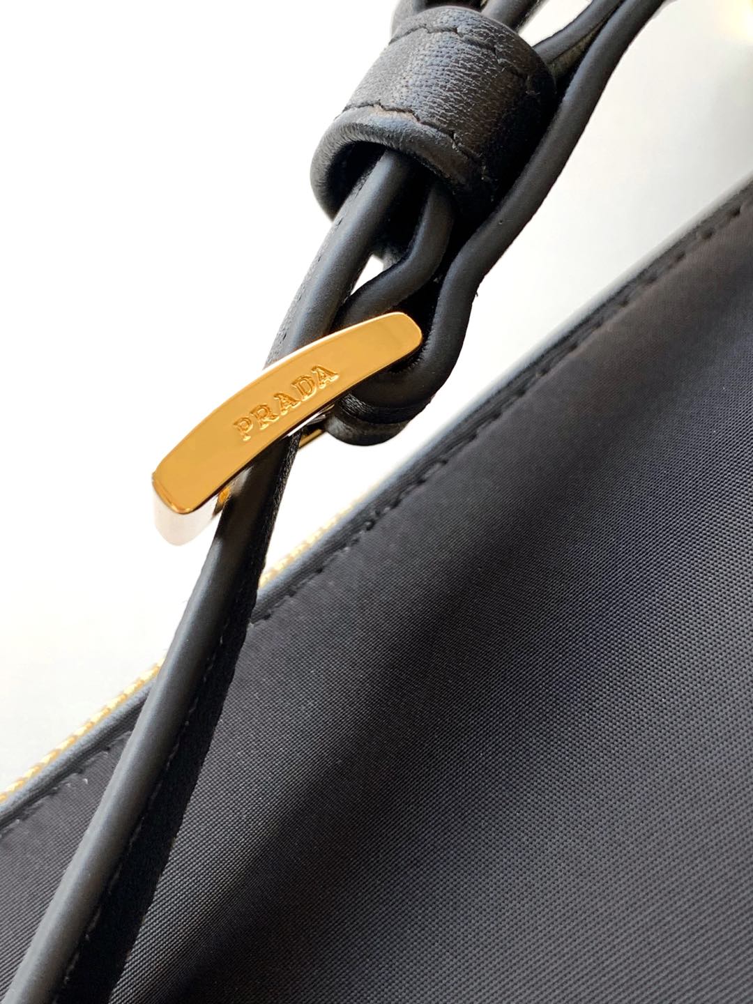 MINI POUCH 27 IN BLACK RE-NYLON AND SAFFIANO LEATHER STRAP