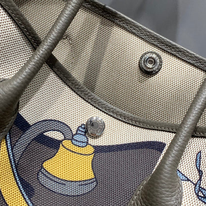 GARDEN PARTY 36 IN IVORY YELLOW BLUE TOILE H CANVAS ETOUPE CALFSKIN EQUESTRIAN HARNESS PRINT