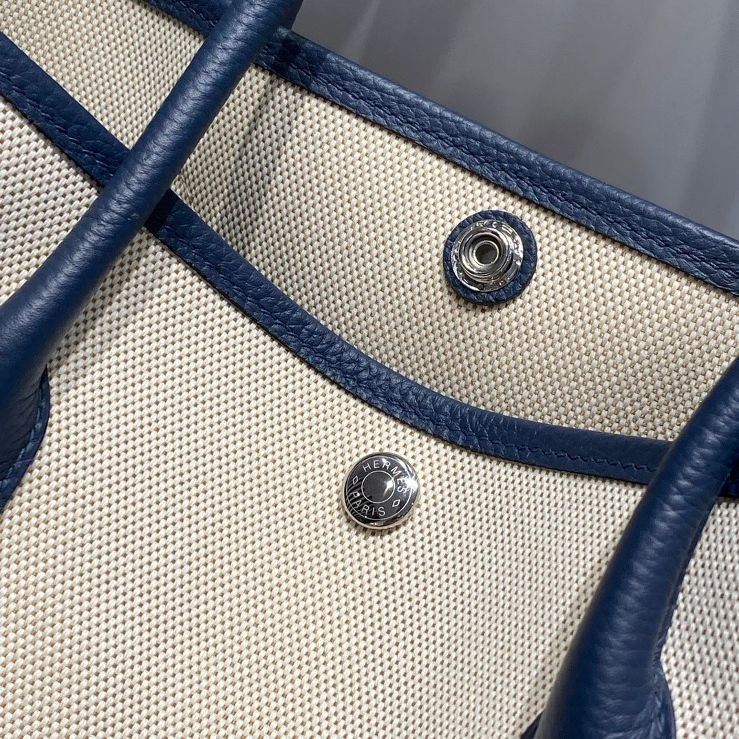 GARDEN PARTY 36 IN NAVY CREAM TOILE H CANVAS BLUE MARINE CALFSKIN ABSTRACT BEAR FACE PRINT