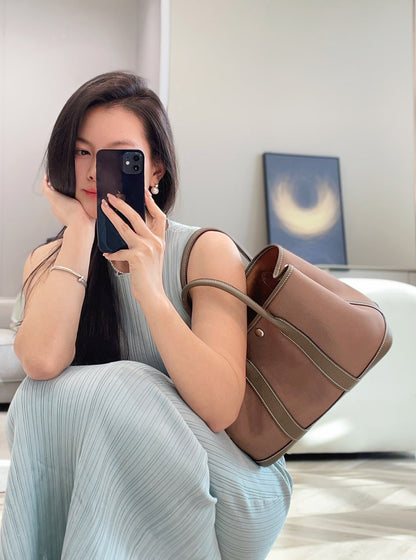 GARDEN PARTY 30CM IN BROWN TOILETS COTTON CANVAS AND TOGO ETOUPE CALFSKIN