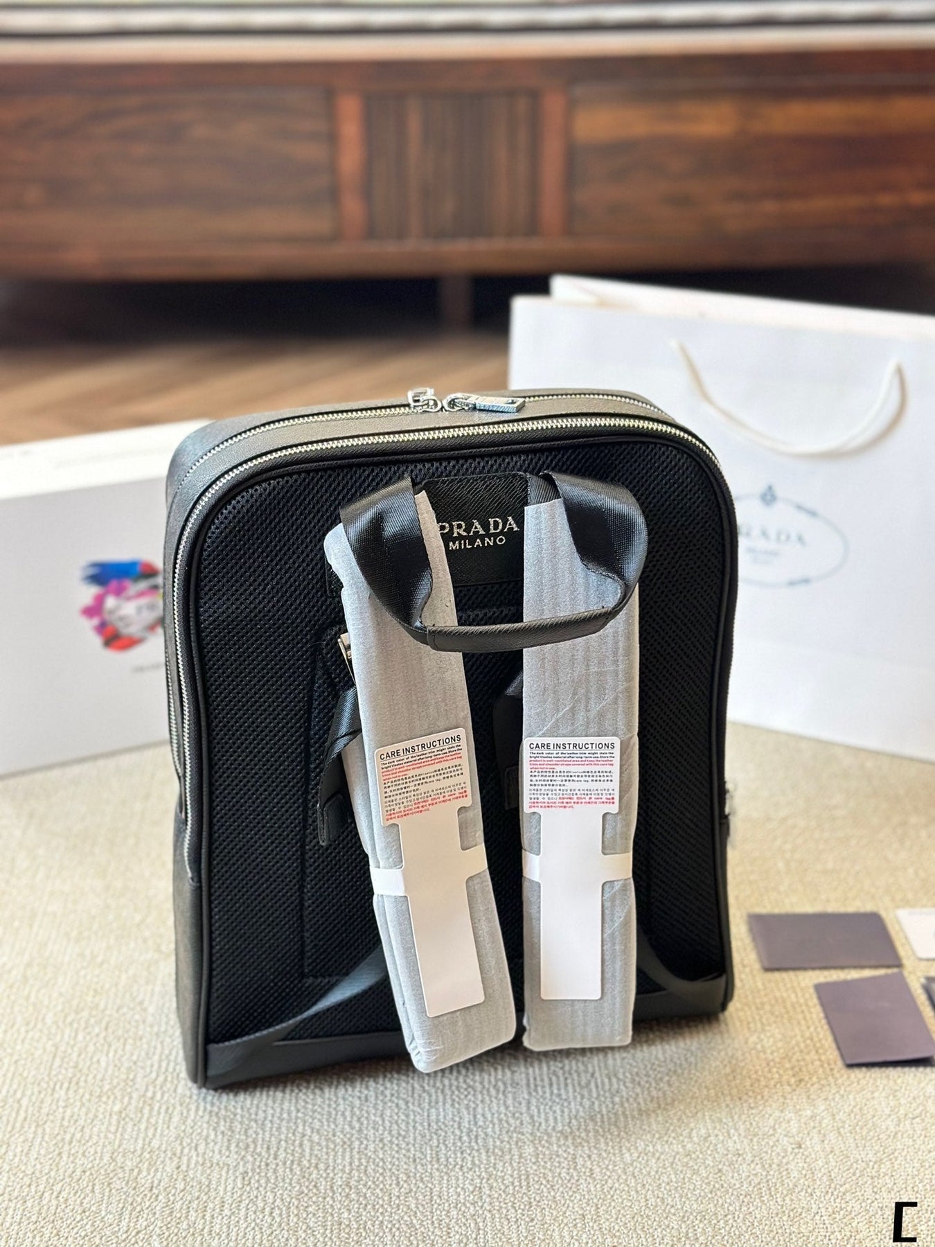 FRONT ZIP POCKET BACKPACK 38 IN BLACK GRAINED CALFSKIN