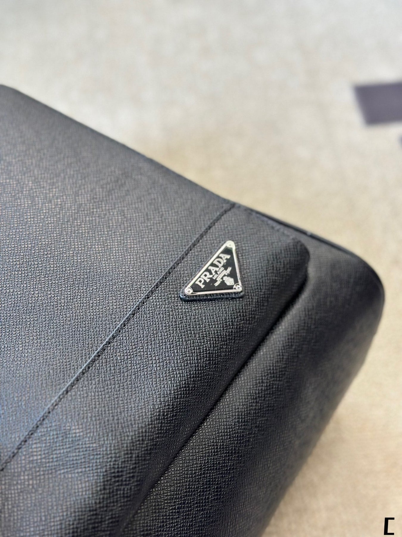 FRONT ZIP POCKET BACKPACK 38 IN BLACK GRAINED CALFSKIN