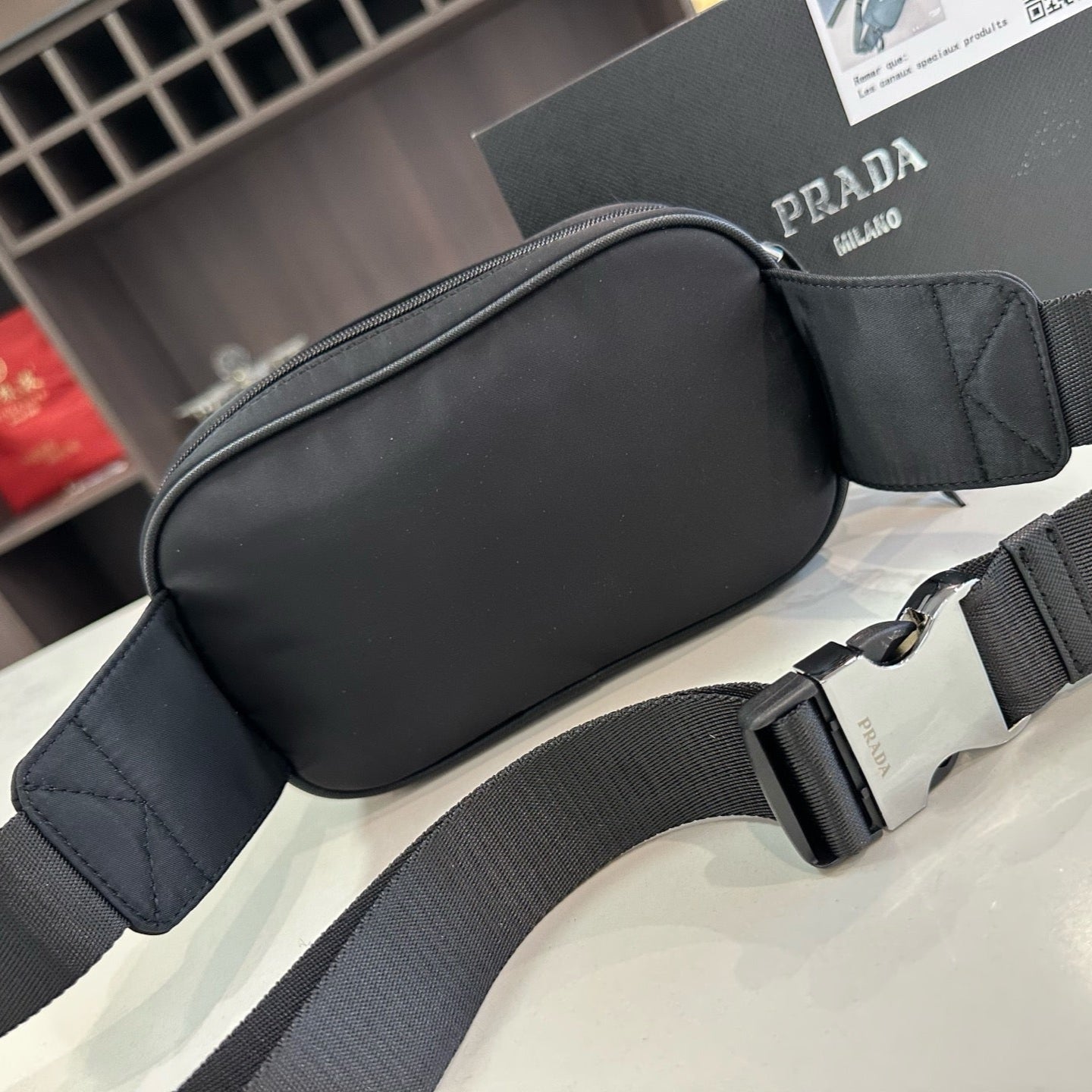 FRONT ZIP POCKET CROSSBODY BAG 24 IN BLACK RE-NYLON