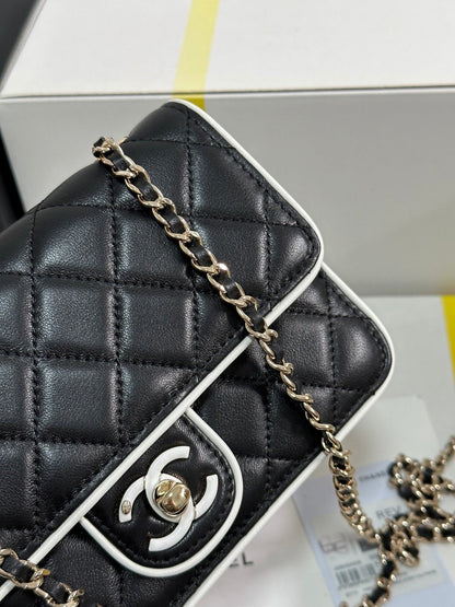 QUILTED FLAP BAG WITH WHITE TRIM 19 IN BLACK LAMBSKIN