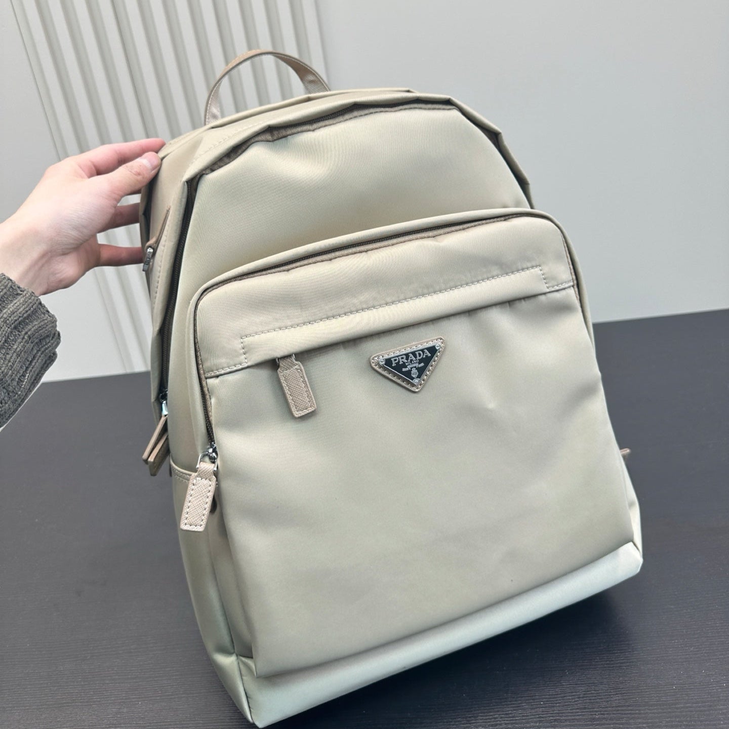 FRONT ZIP POCKET BACKPACK 40 IN BEIGE RE-NYLON