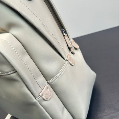 FRONT ZIP POCKET BACKPACK 40 IN BEIGE RE-NYLON