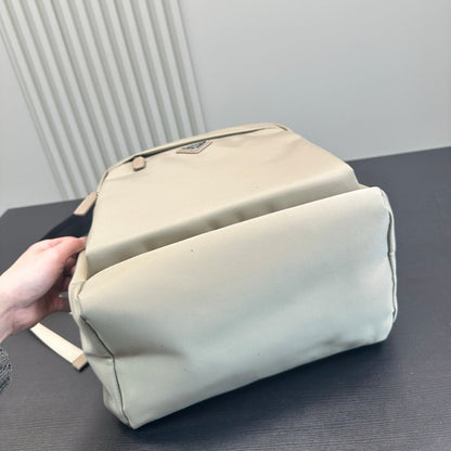 FRONT ZIP POCKET BACKPACK 40 IN BEIGE RE-NYLON