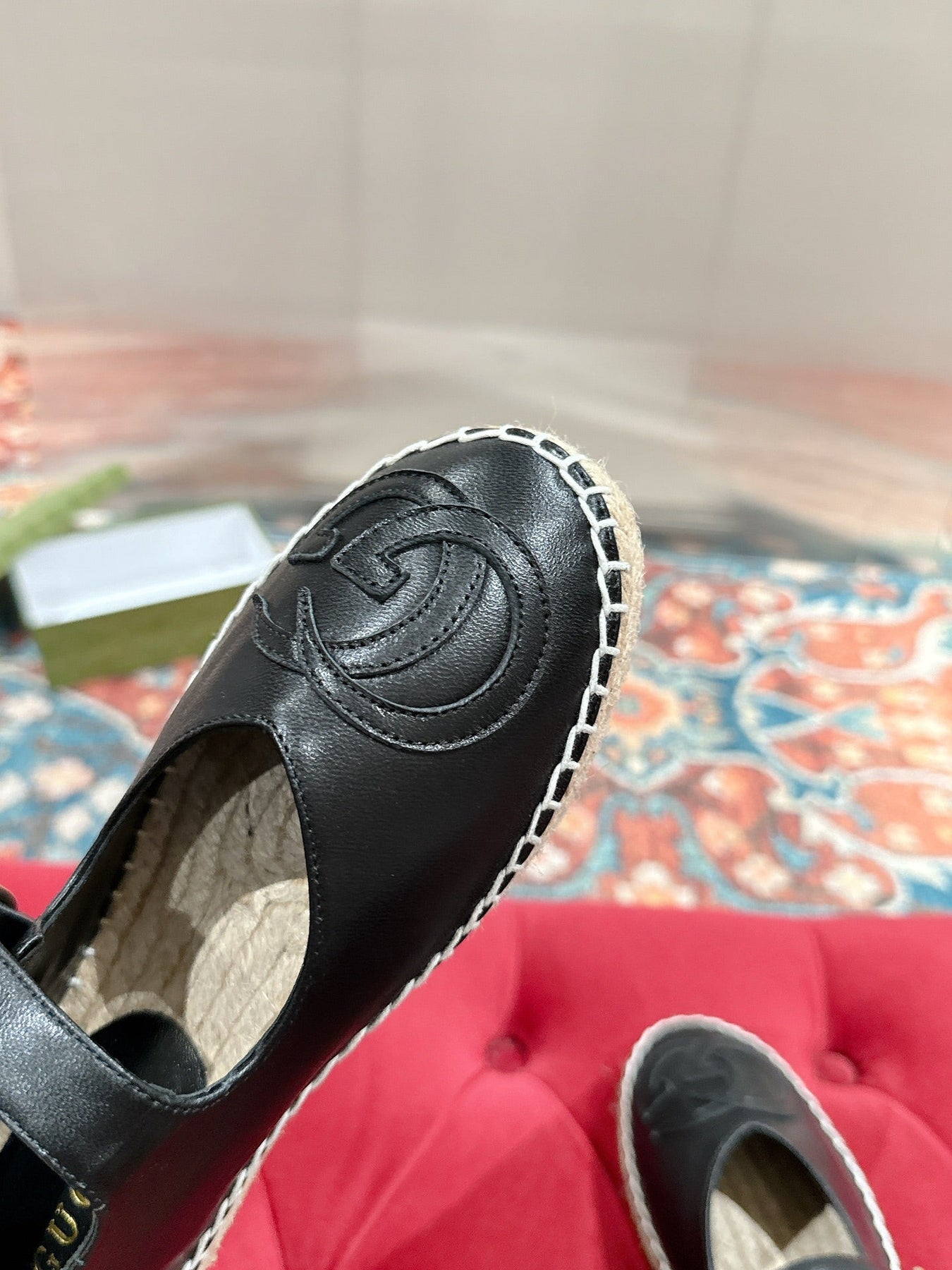 GG CROSS STRAP FLAT SHOES IN BLACK CALFSKIN WITH STRAW SOLE