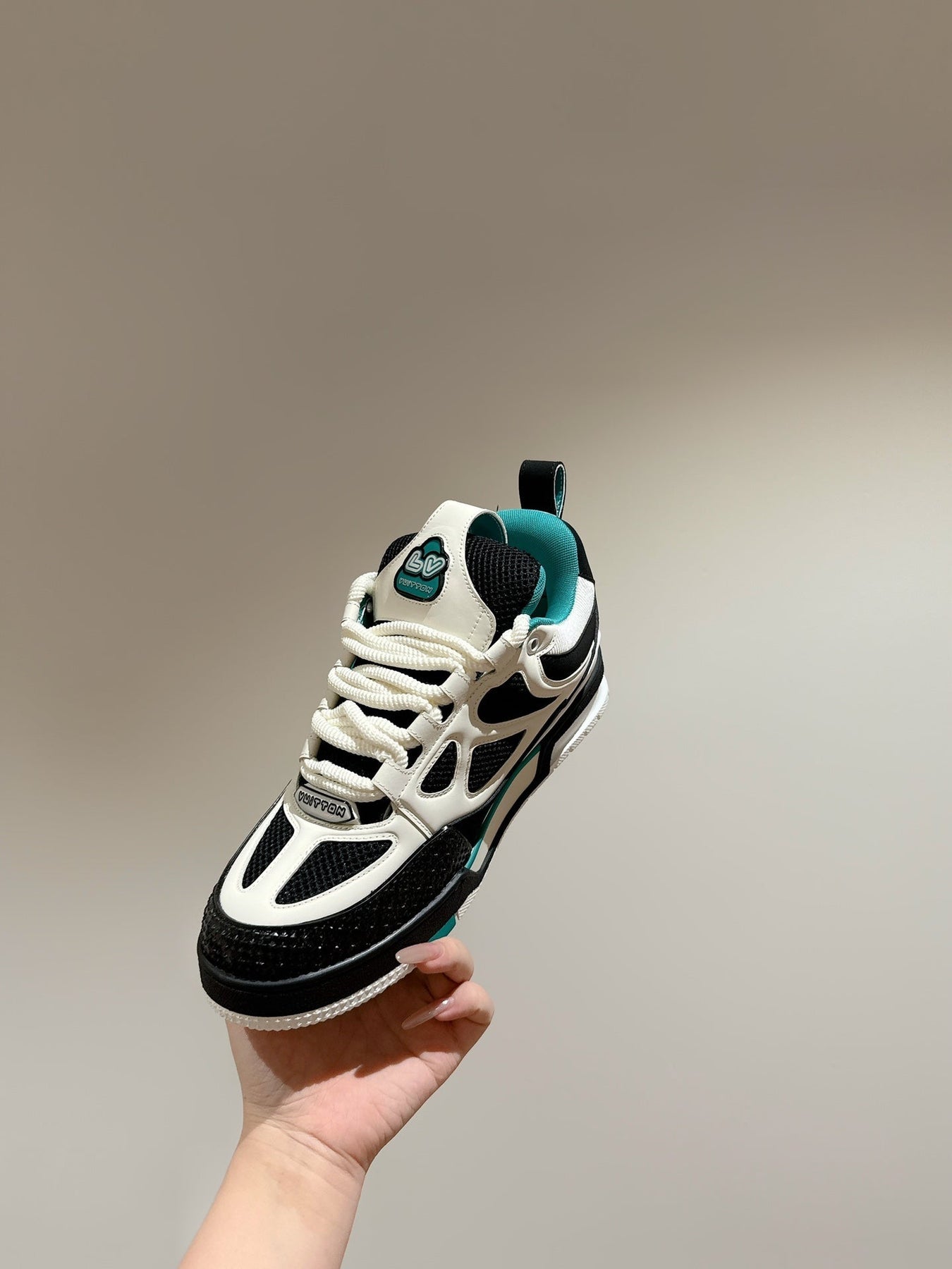 LV SKATE SNEAKER IN WHITE MIX BLACK AND PERSIAN GREEN CALFSKIN