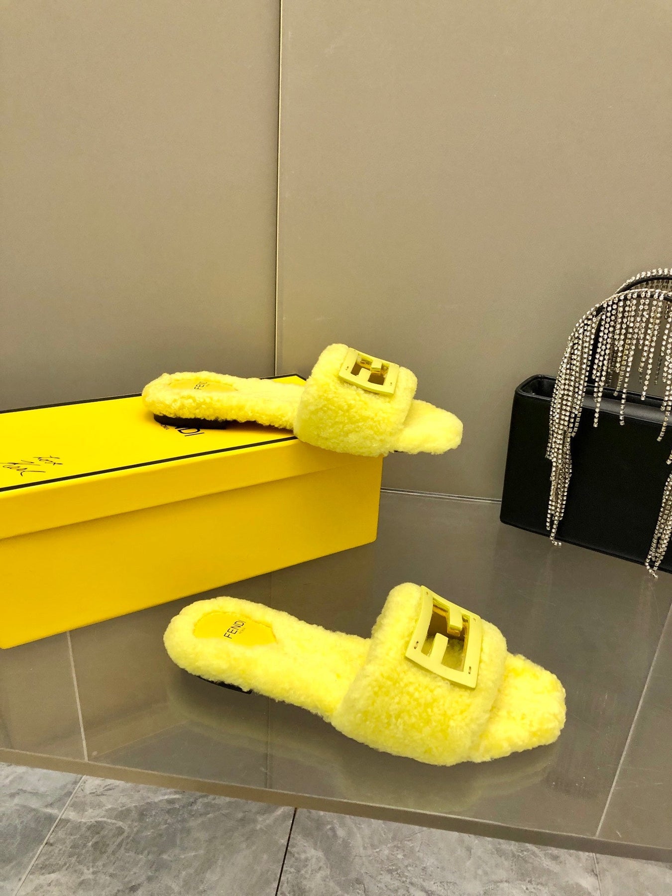 FENDI BAGUETTE SLIDE SLIPPERS IN BRIGHT YELLOW WOOL