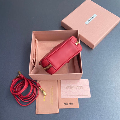 MICRO BAG KEYCHAIN 11 IN TALL POPPY RED CALFSKIN EMBOSSED LOGO