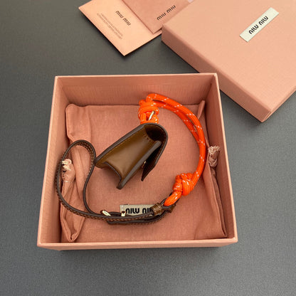 MICRO BAG 7 IN TAWNY BROWN SMOOTH LAMBSKIN ORANGE STRAP