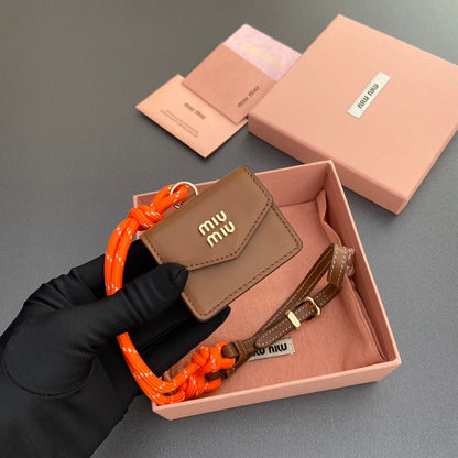 MICRO BAG 7 IN TAWNY BROWN SMOOTH LAMBSKIN ORANGE STRAP