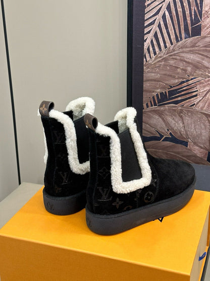 ASPEN CHELSEA ANKLE BOOTS IN BLACK MONOGRAM-DEBOSSED SUEDE