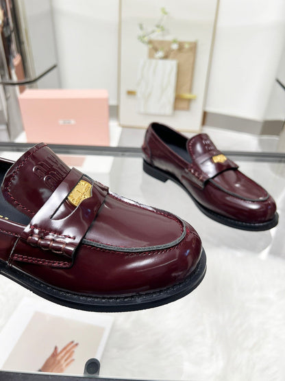 PENNY LOAFERS IN BURGUNDY RED GLOOSY CALFSKIN