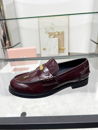 PENNY LOAFERS IN BURGUNDY RED GLOOSY CALFSKIN