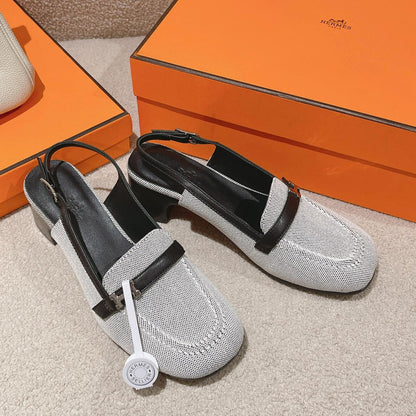 INFINIE 50 PUMP BLACK AND WHITE LAMBSKIN