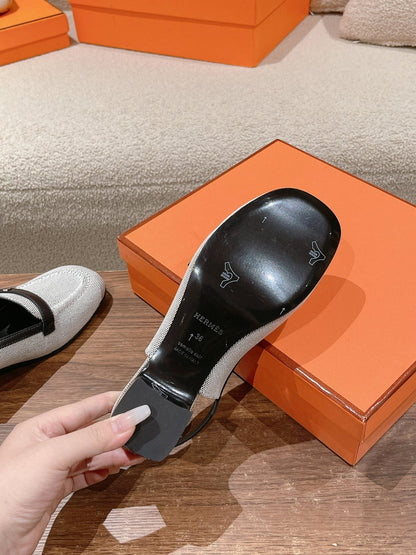 INFINIE 50 PUMP BLACK AND WHITE LAMBSKIN